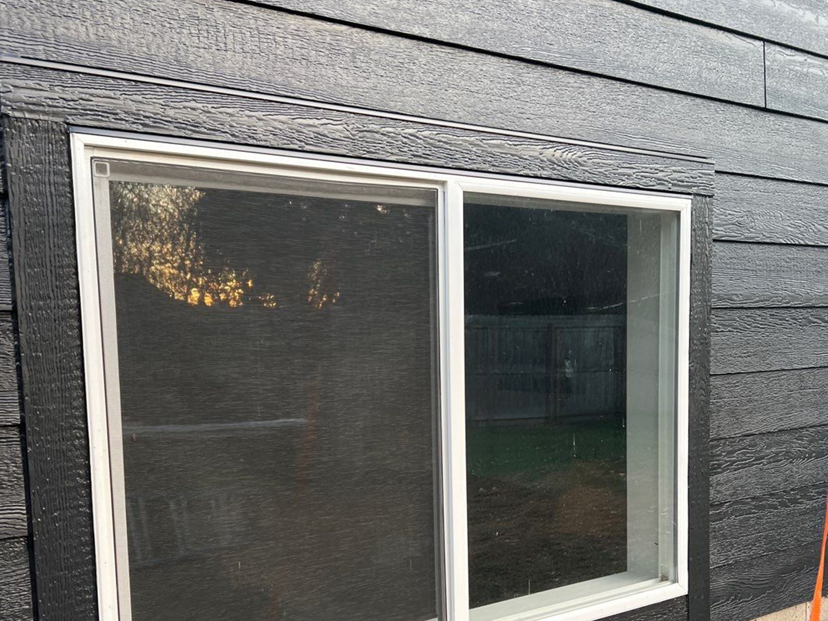 residential house siding around a window